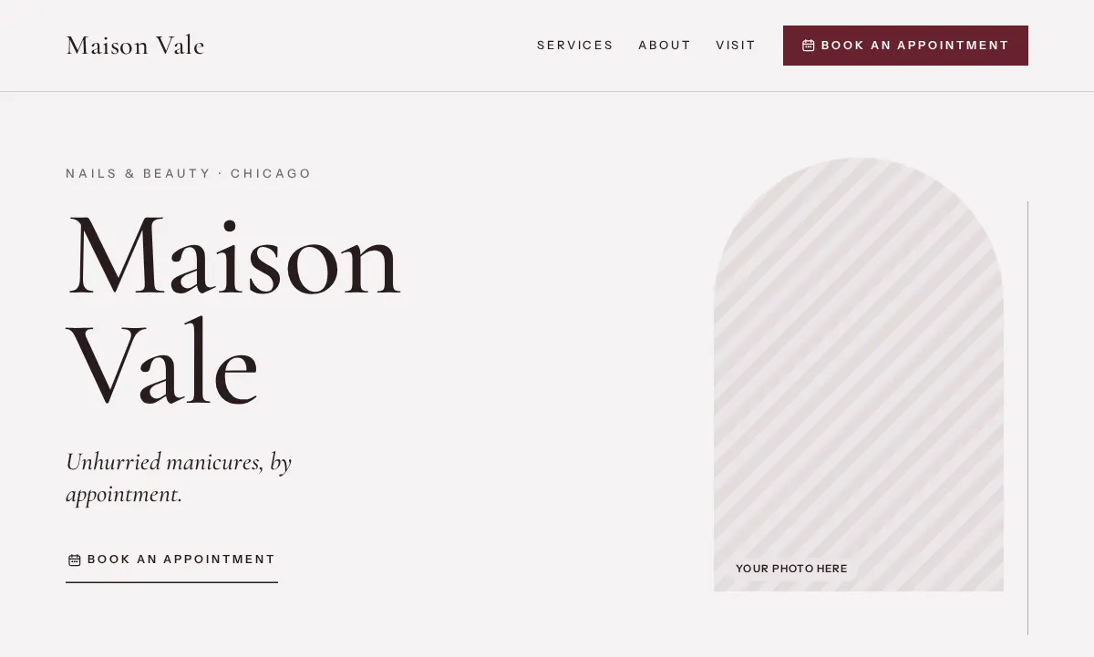 Desktop concept for Maison Vale, a fictional nail studio in Chicago: a large high-contrast serif name, generous whitespace and an arched photo placeholder.